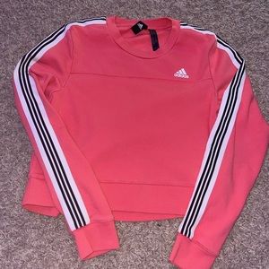 Adidas coral pink crewneck with side details!